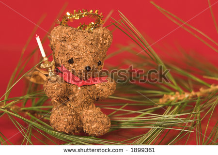 stock-photo-christmas-bear-angel-decoration-on-red-1899361